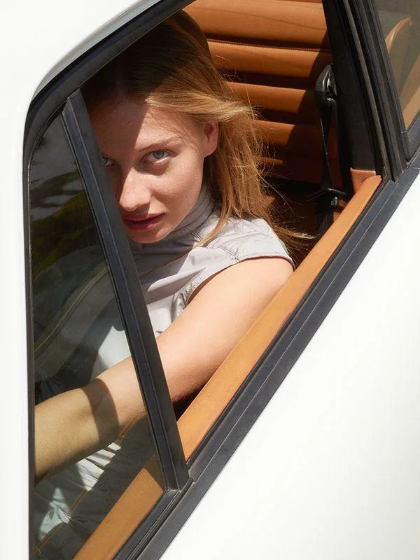 best-glossier-products-spf-woman-driving