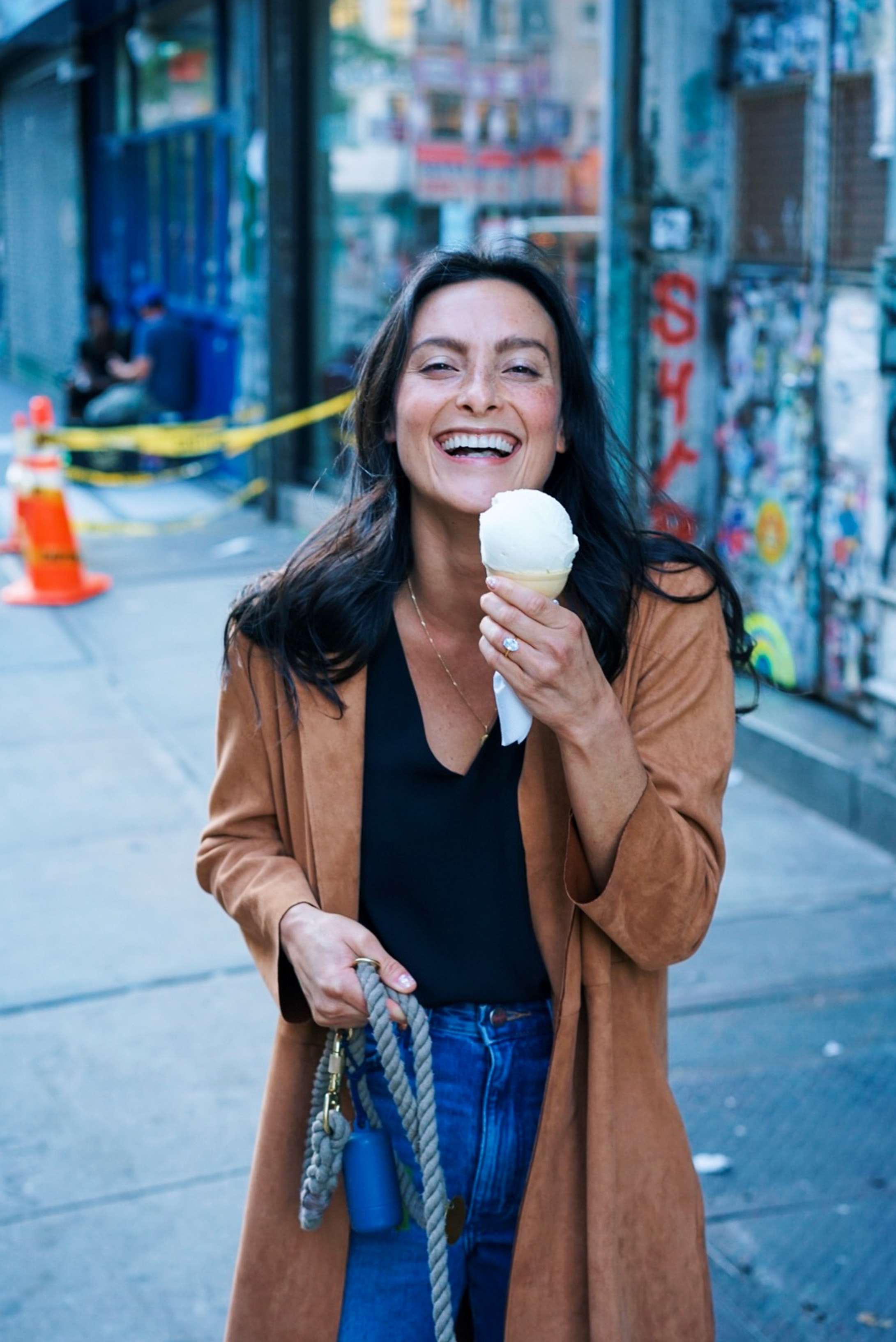 woman-eating-ice-cream-in-street