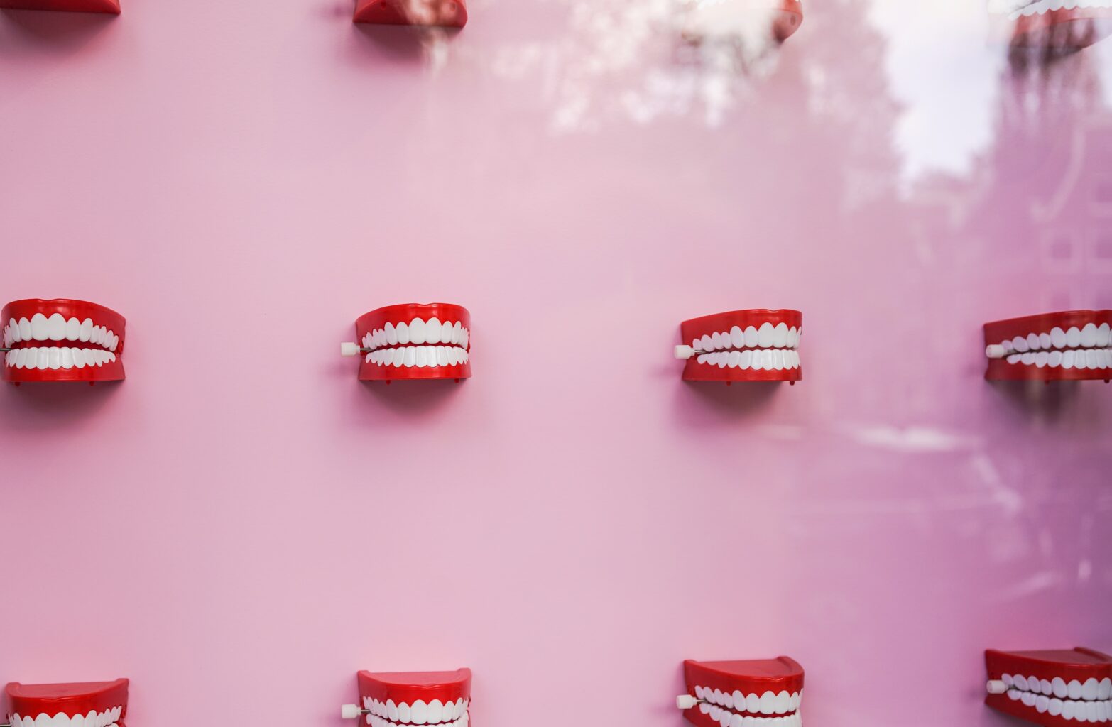 teeth-pink-background-bizarre-things-people-believed-about-women