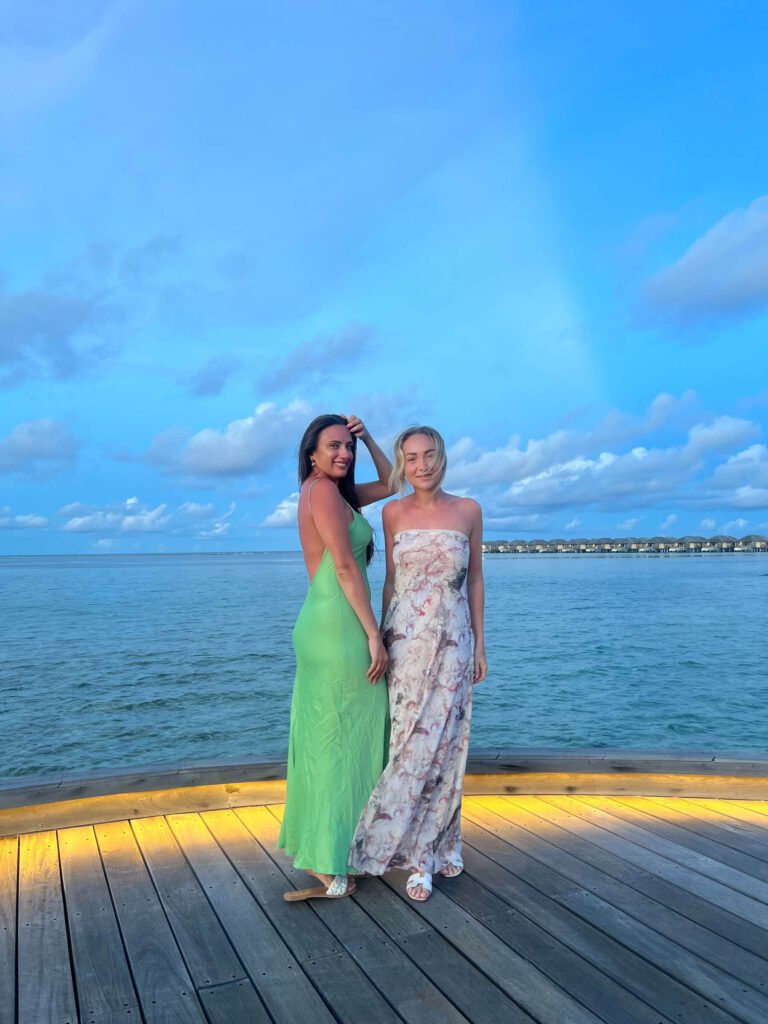 Women Reviewing The Residence Maldives 