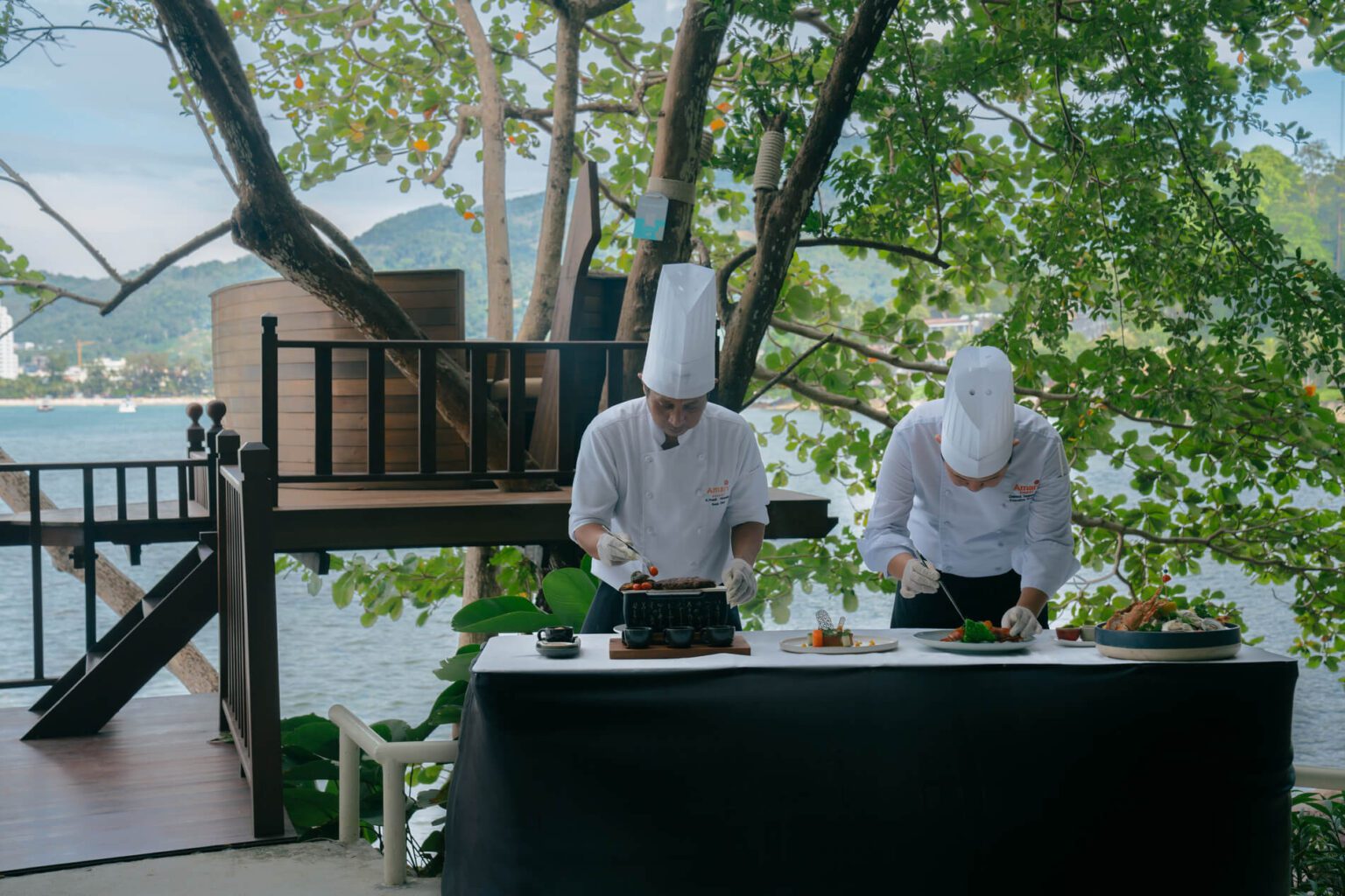 Chefs preparing food at tree pods - Amari Phuket private dining 