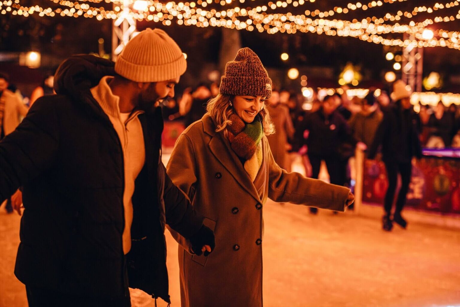 Couple Iceskating at Hyde Park Winter Wonderland - Christmas Things To Do In London