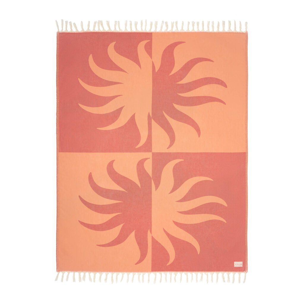 Burga Sunkissed Beach Blanket – large fringed orange and coral patterned summer beach blanket with abstract sun design